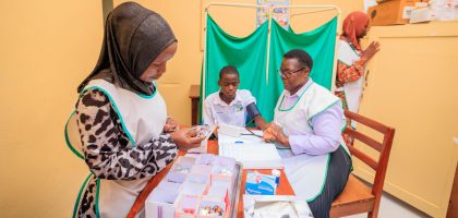 School nurses in sick bay treating student